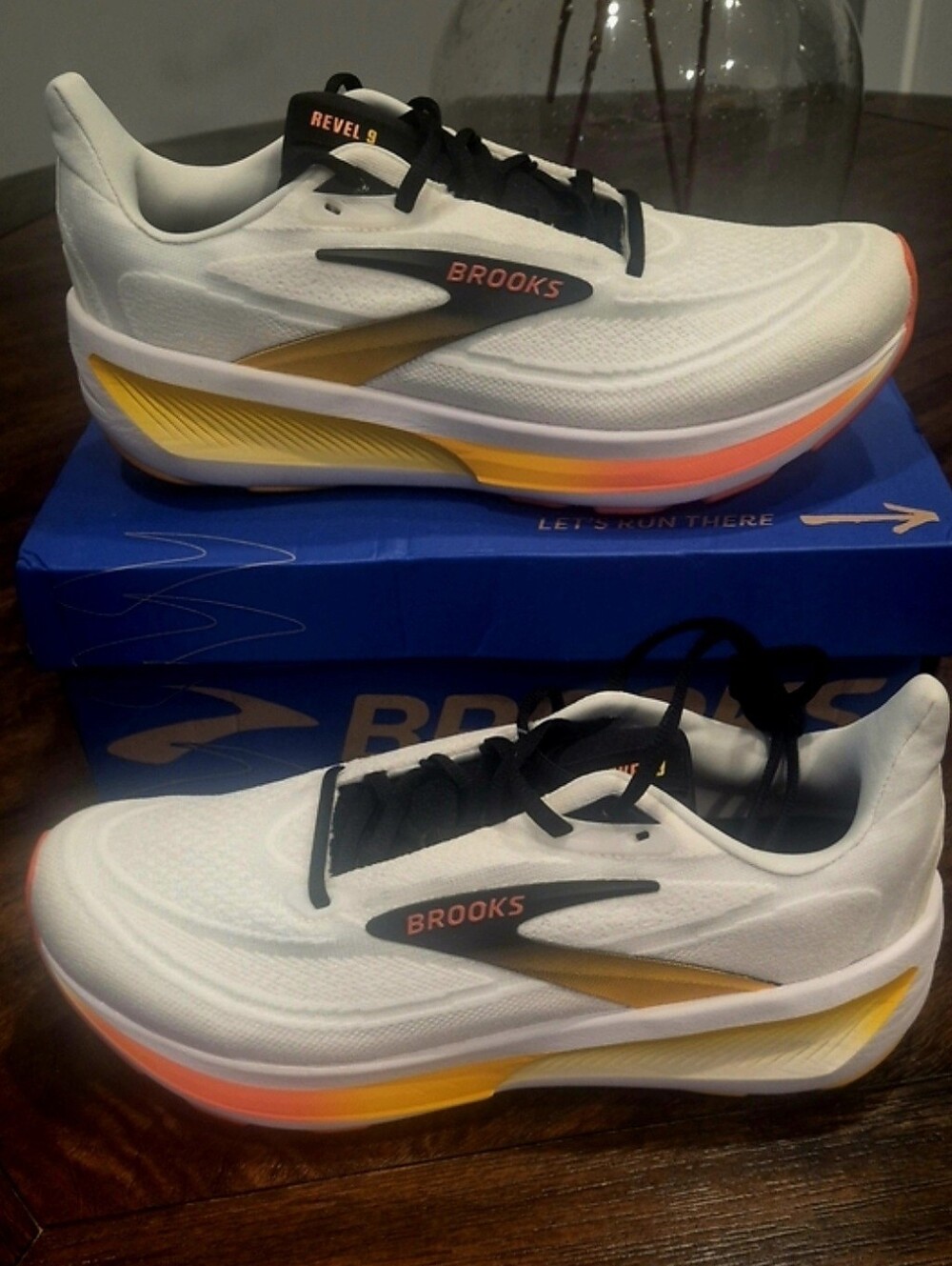 New Brooks Men's Revel 9 White Running Shoes with Yellow and Orange Accents